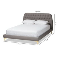 Krevet na platformi veličine MBP-a s presvlakama od svijetlosive tkanine na nogama sa zlatnim oblogama